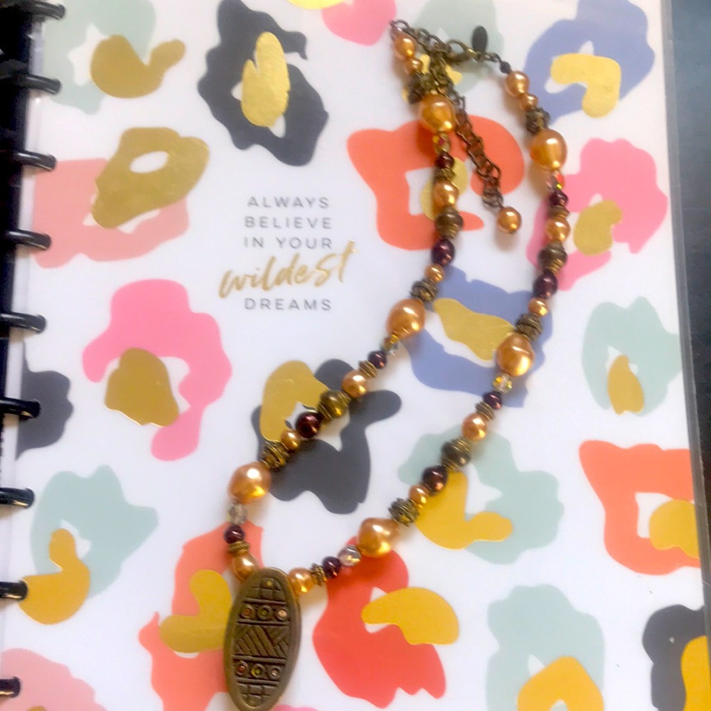 Chicos beaded necklace with brass look pendant